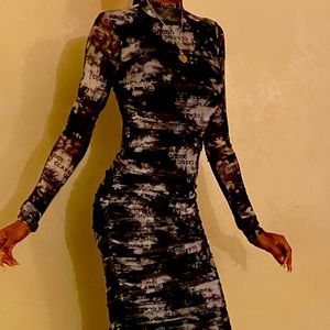 Fit all your curves dress newspaper print